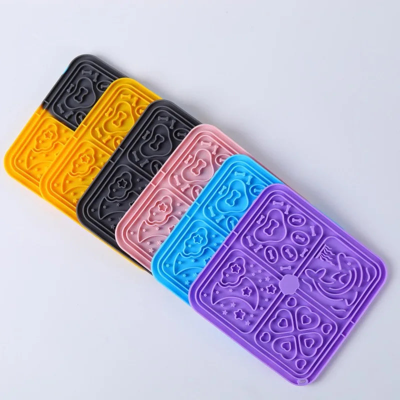 Lick mats stacked in several colors